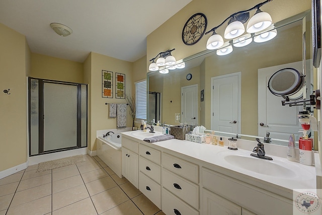 bathroom featuring independent shower and bath, vanity, and tile patterned flooring