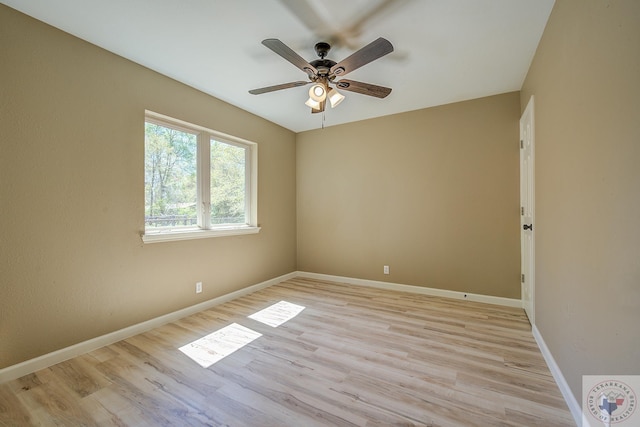 unfurnished room with ceiling fan and light wood-type flooring