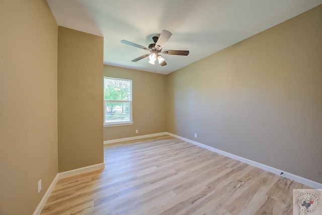 empty room featuring light hardwood / wood-style floors and ceiling fan