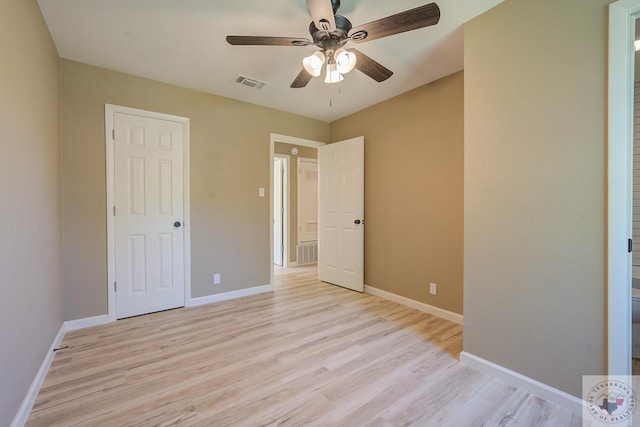 unfurnished bedroom with ceiling fan and light hardwood / wood-style flooring