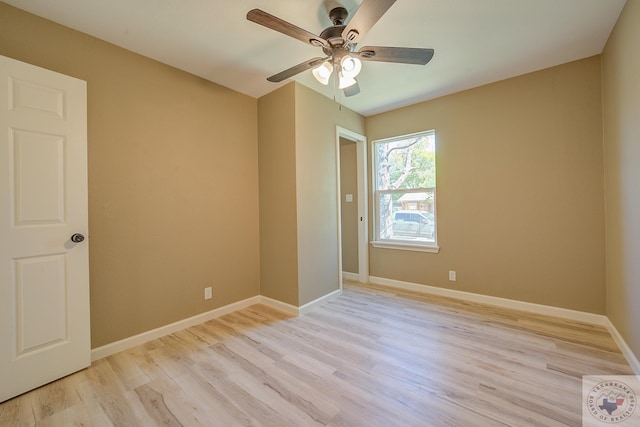 spare room featuring ceiling fan and light hardwood / wood-style floors