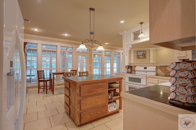 kitchen with pendant lighting, white appliances, ventilation hood, kitchen peninsula, and light tile patterned floors