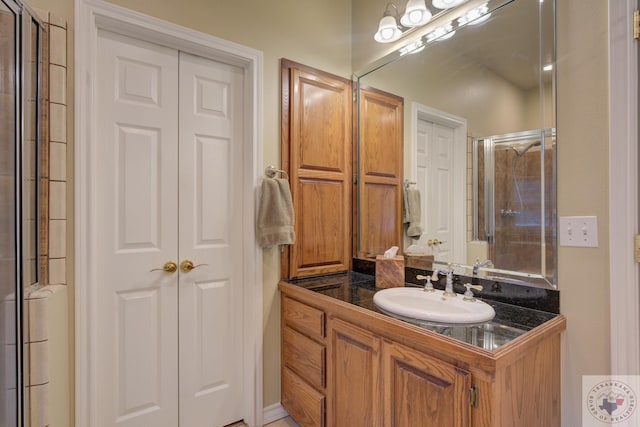 bathroom featuring vanity and walk in shower