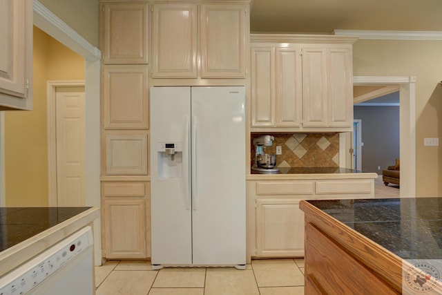 kitchen featuring white appliances, ornamental molding, tasteful backsplash, and light tile patterned flooring