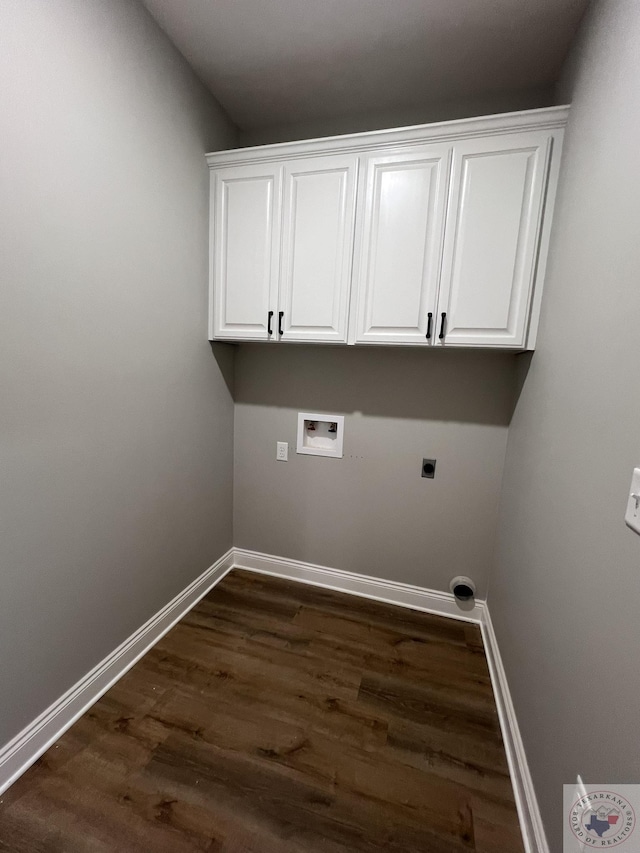 washroom with washer hookup, hookup for an electric dryer, cabinets, and dark hardwood / wood-style flooring