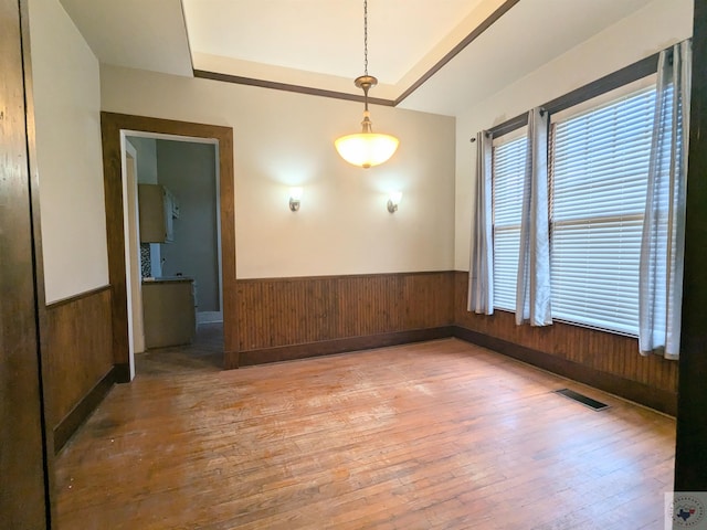 unfurnished room with light wood-type flooring