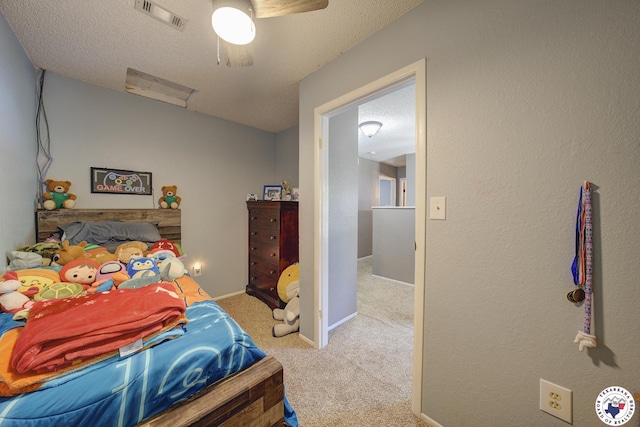 13 Timberlane St, Texarkana, TX 75501 - bedroom featuring carpet floors, a textured ceiling, and a ceiling fan