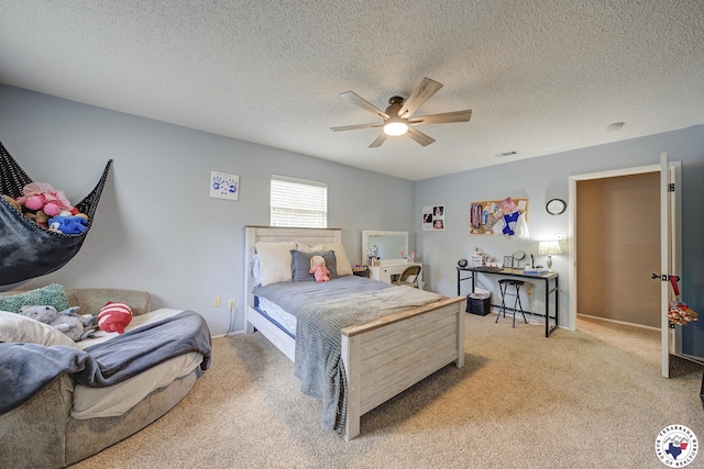 13 Timberlane St, Texarkana, TX 75501 - carpeted bedroom featuring a ceiling fan and a textured ceiling