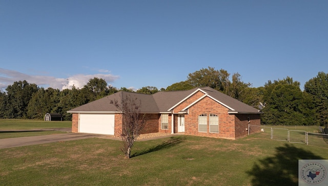 single story home with a garage and a front lawn