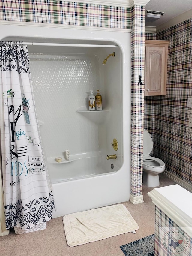 bathroom featuring toilet, shower / bathtub combination with curtain, and ornamental molding