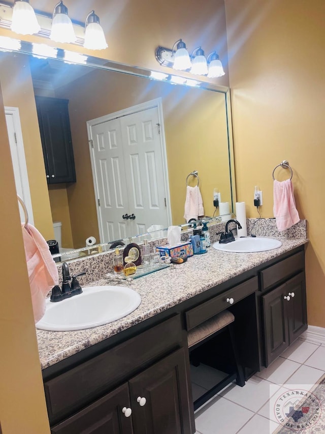 bathroom featuring vanity and tile patterned floors