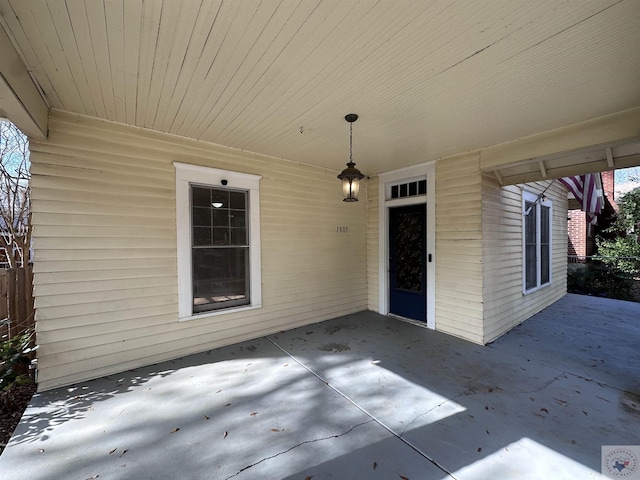 doorway to property featuring a patio area