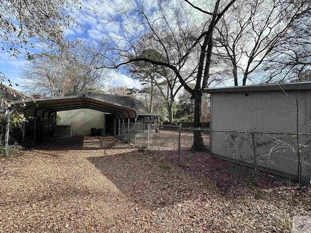 view of yard featuring a carport