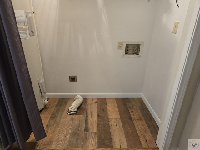 laundry room with hookup for an electric dryer, dark hardwood / wood-style floors, and hookup for a washing machine