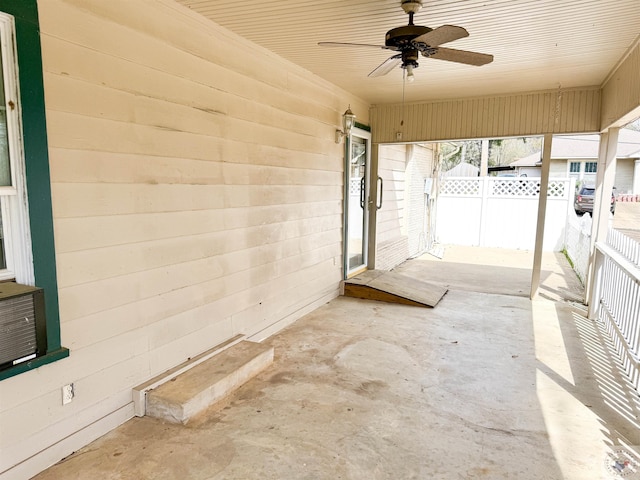 view of patio featuring ceiling fan