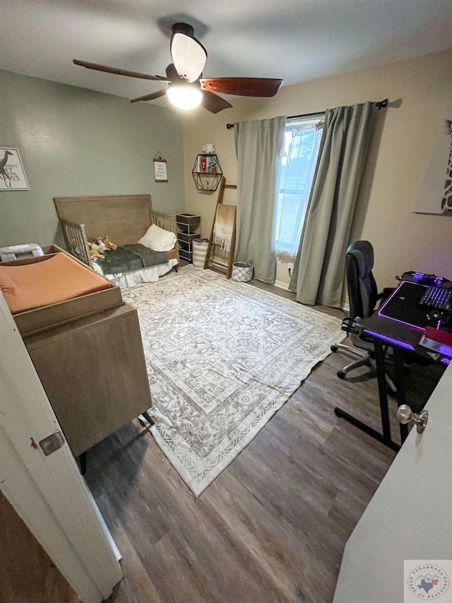 home office with wood-type flooring