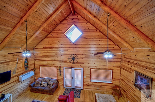 unfurnished living room with light hardwood / wood-style floors, wood walls, wood ceiling, and vaulted ceiling with beams