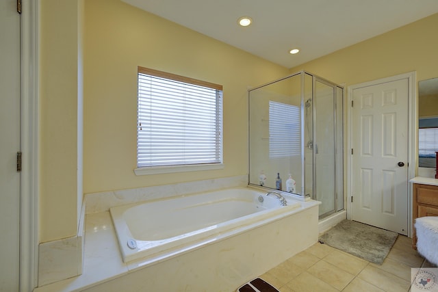 full bath with recessed lighting, a stall shower, a bath, tile patterned floors, and vanity