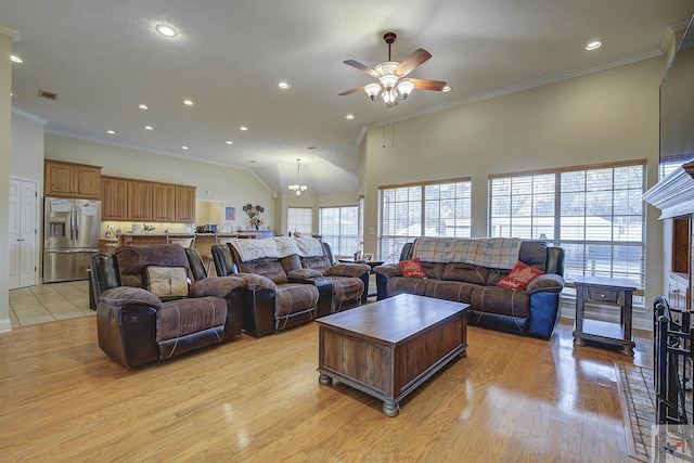 living room featuring light wood finished floors, visible vents, recessed lighting, and crown molding