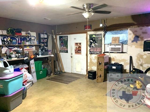 storage area featuring ceiling fan