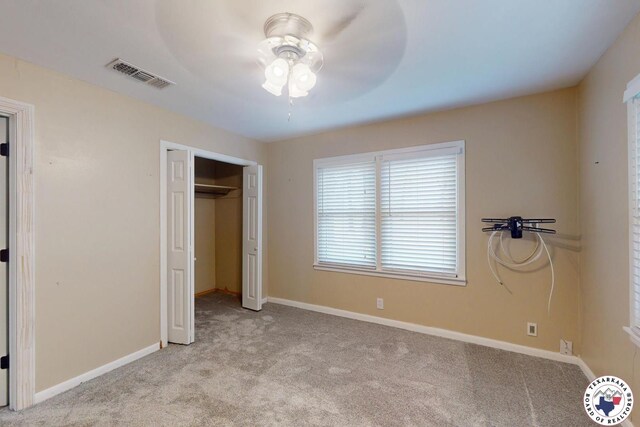 2101 N Fm 2148, Texarkana, TX 75501 - unfurnished bedroom featuring carpet, baseboards, ceiling fan, and a closet