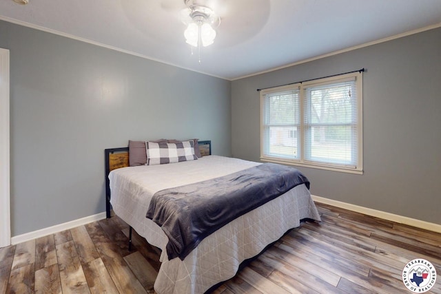 2101 N Fm 2148, Texarkana, TX 75501 - bedroom with wood finished floors, ornamental molding, baseboards, and a ceiling fan