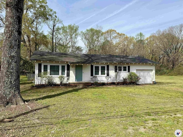 2101 N Fm 2148, Texarkana, TX 75501 - ranch-style house featuring an attached garage and a front lawn