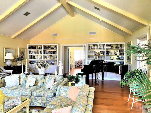 501 Park St, Atlanta, TX 75551 - living area featuring visible vents, lofted ceiling with beams, and wood finished floors