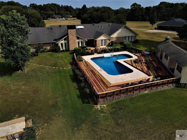 501 Park St, Atlanta, TX 75551 - view of swimming pool featuring a fenced in pool, a lawn, and a patio