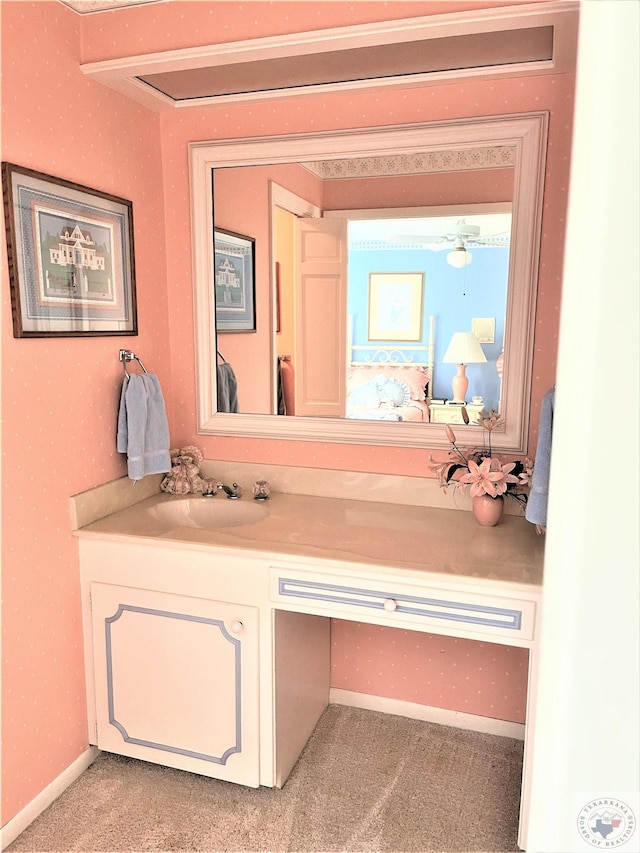 501 Park St, Atlanta, TX 75551 - bathroom featuring vanity, baseboards, and wallpapered walls