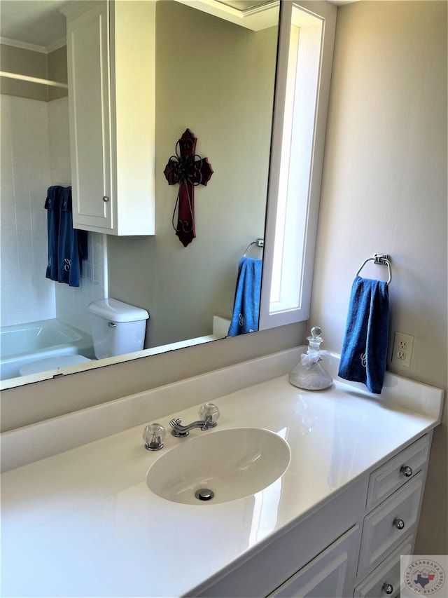 501 Park St, Atlanta, TX 75551 - bathroom featuring tub / shower combination, vanity, and toilet