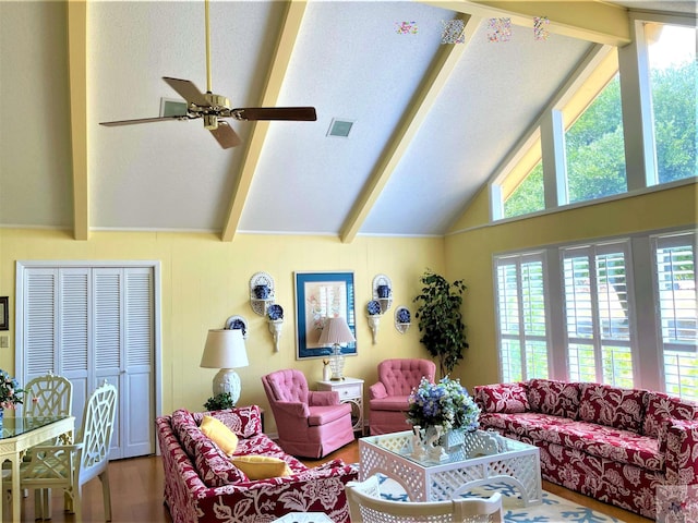 501 Park St, Atlanta, TX 75551 - living room with lofted ceiling with beams, plenty of natural light, visible vents, and wood finished floors