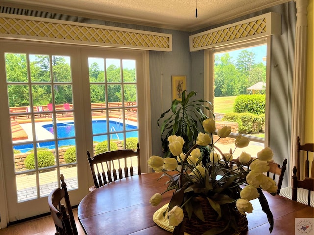 501 Park St, Atlanta, TX 75551 - dining space with a textured ceiling and crown molding