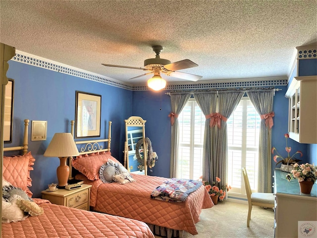 501 Park St, Atlanta, TX 75551 - carpeted bedroom with a textured ceiling and ceiling fan