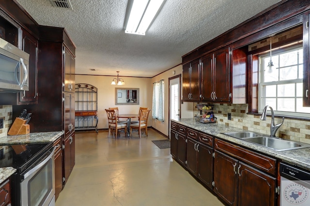 kitchen featuring visible vents, finished concrete floors, stainless steel appliances, pendant lighting, and a sink