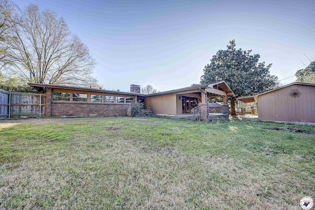view of yard with fence