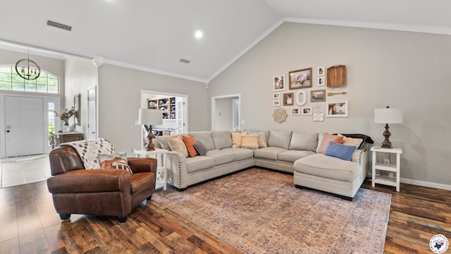 living room featuring visible vents, crown molding, high vaulted ceiling, dark wood-style floors, and a chandelier