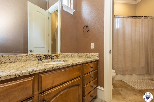bathroom with a textured wall, tile patterned flooring, vanity, toilet, and ornamental molding