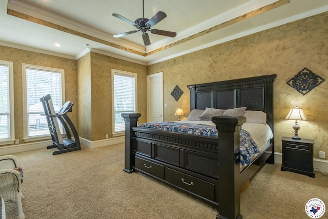 bedroom with crown molding, carpet, baseboards, and multiple windows