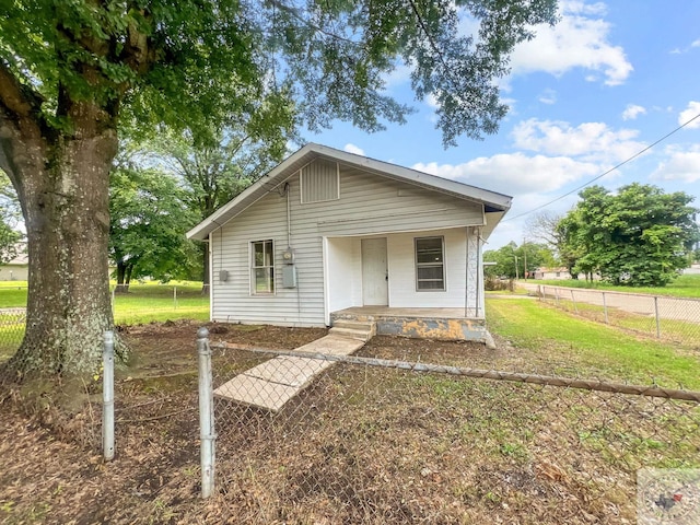 view of front of property with a front lawn and a porch