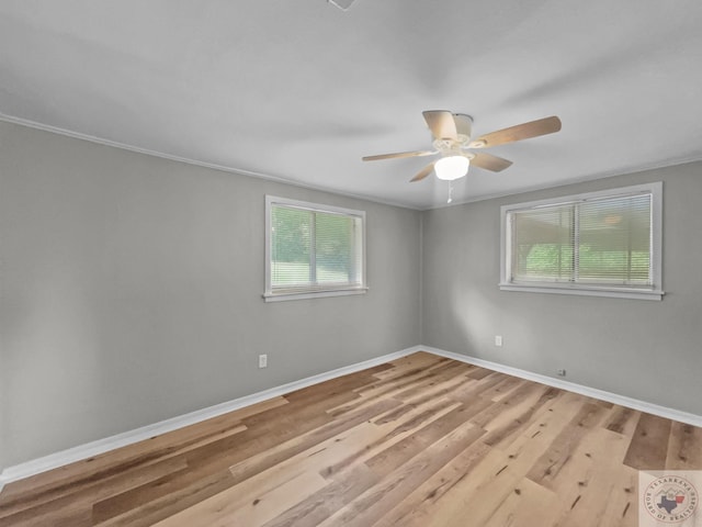 unfurnished room with light wood-type flooring, ceiling fan, and ornamental molding