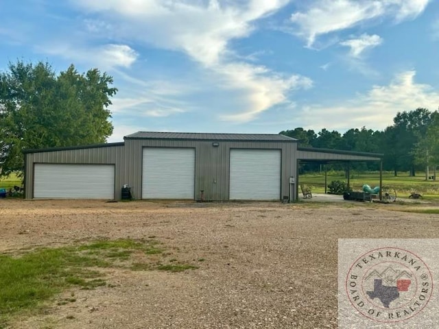 garage with a carport