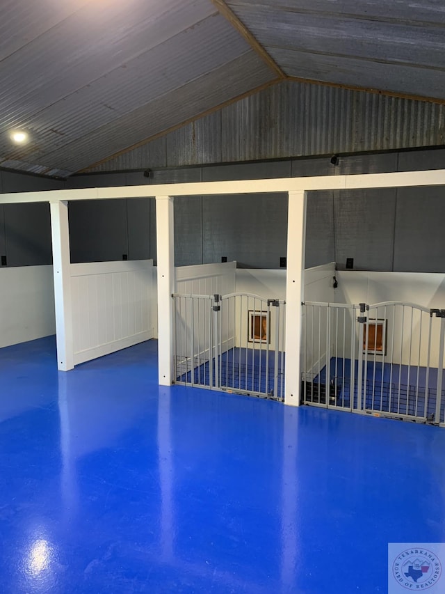 interior space with concrete floors and lofted ceiling