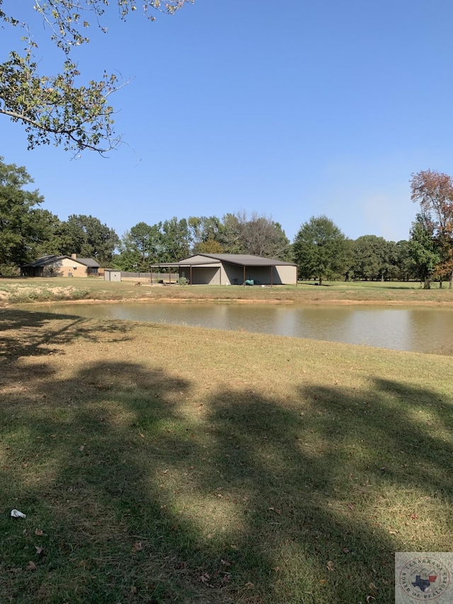 view of yard with a water view