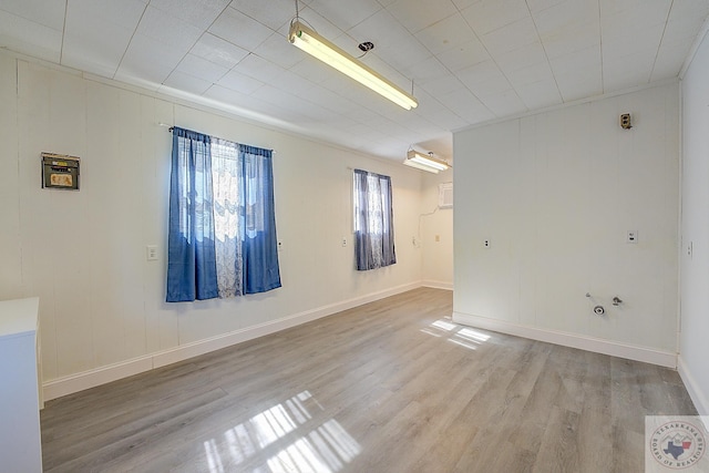 spare room with light wood-type flooring