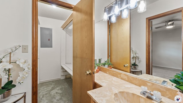 4707 Charleston St, Texarkana, AR 71854 - bathroom featuring electric panel, vanity, a textured ceiling, and baseboards