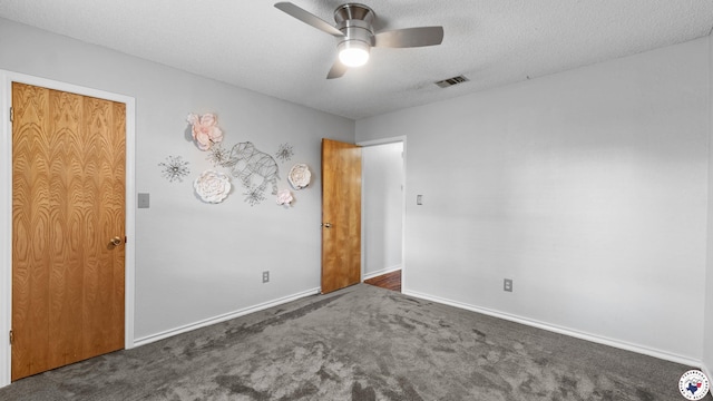 4707 Charleston St, Texarkana, AR 71854 - unfurnished bedroom with carpet floors, baseboards, a textured ceiling, and a ceiling fan