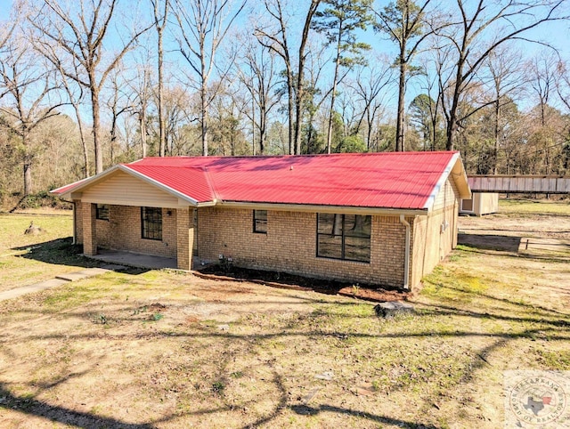 exterior space with a front lawn