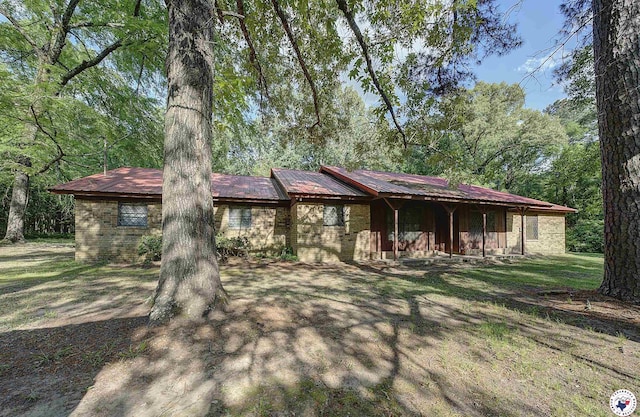 ranch-style home with brick siding