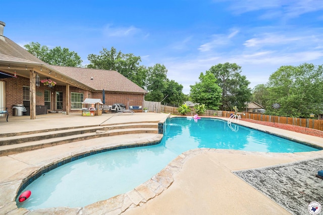 215 Hunters Cv, Texarkana, TX 75503 - view of swimming pool with a patio and a fenced backyard